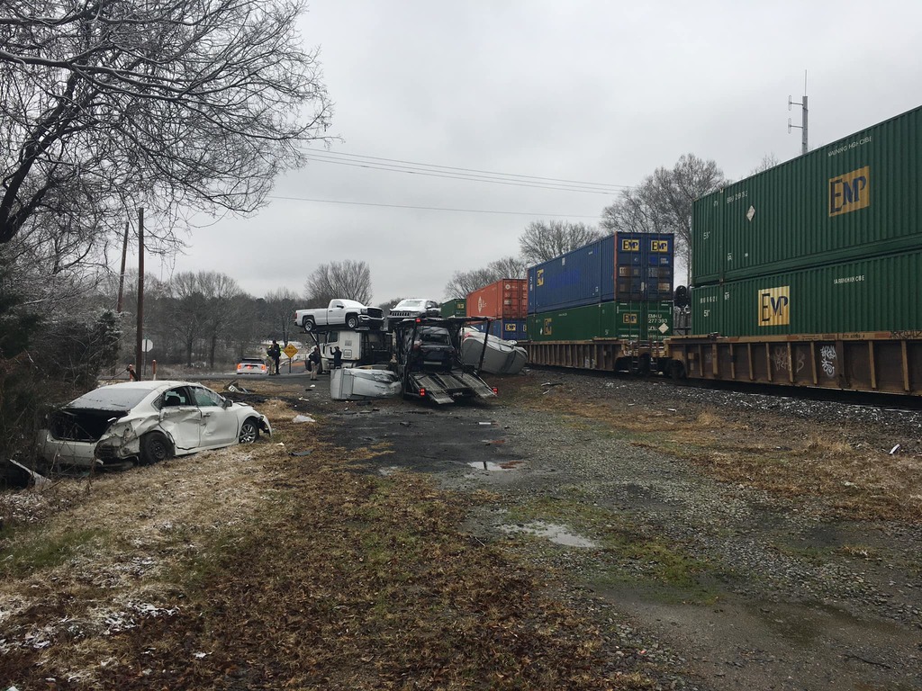 A train crash in Caddo Parish has closed a busy state highway.