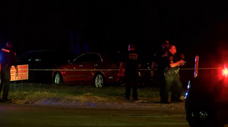 Dozens of evidence markers can be seen in the street as Shreveport police investigate a report of a shooting at Jewella at West 70th. At least 21 police units have responded