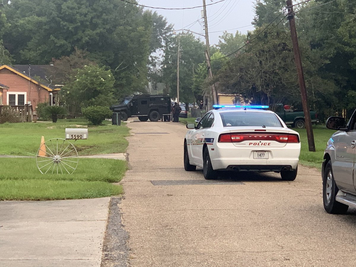 Suspect taken into custody following shooting on Cadillac street at 2:30 this morning. Suspect was taken into custody right here on Packard Street. SWAT was on scene working to get the suspect to surrender. 