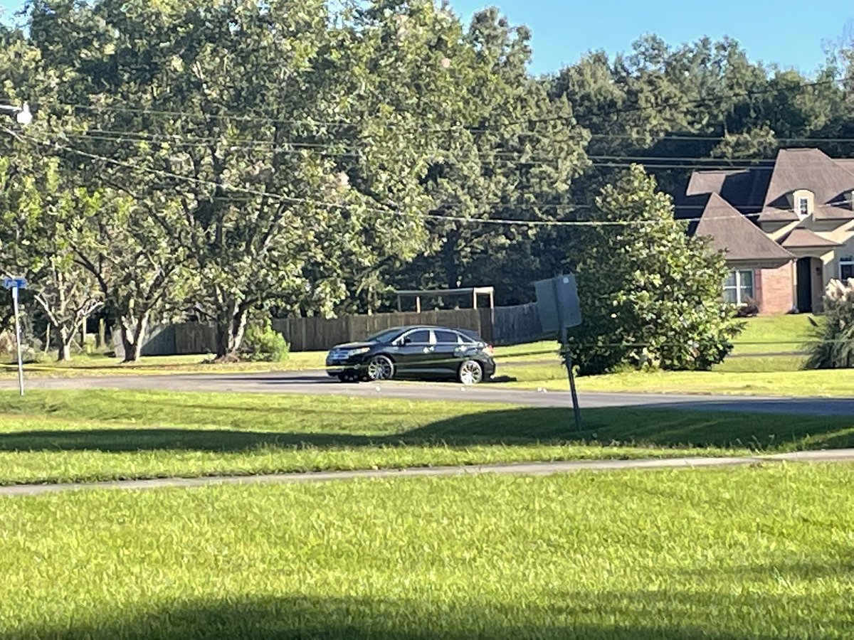 this morning a fatal shooting on Wisdom Ave in Baker What you're looking at is a car on scene that appears to have gunshot holes to the side of the vehicle 