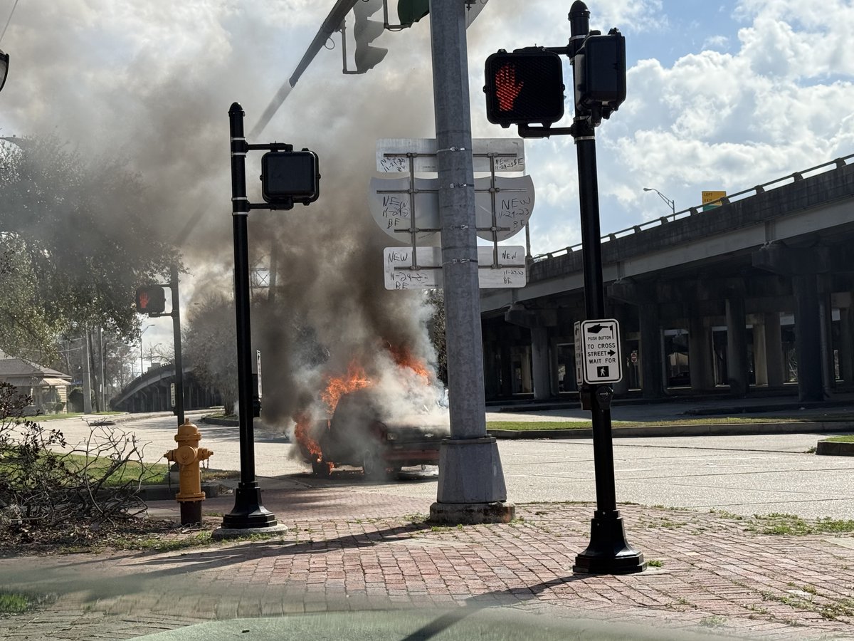 Officials say a driver was uninjured when their truck caught on fire Sunday afternoon on North 10th Street, which runs along I-110